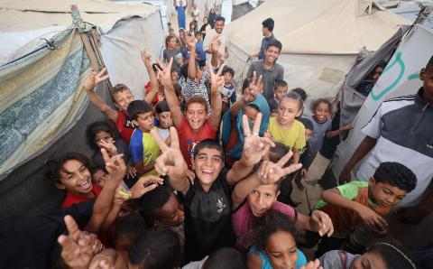 Fred og glade barn i Gaza